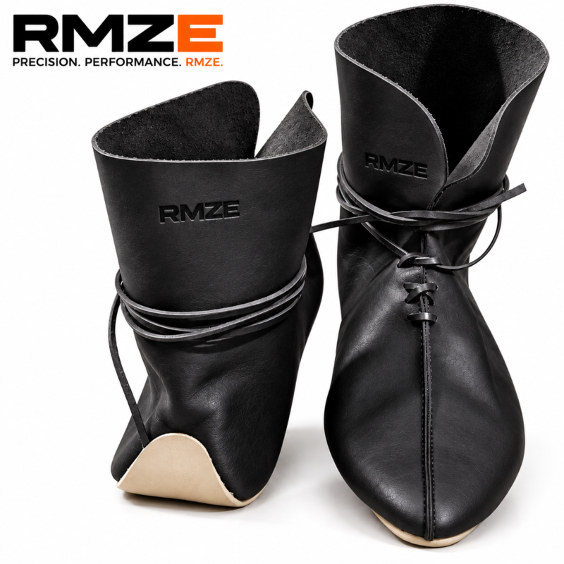 RMZE black medieval-inspired leather footwear with tall cuff, lace-up front and wraparound straps