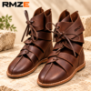 RMZE brown strappy medieval-inspired boots with overlapping upper panels and lace-up detailing