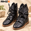 RMZE black strappy medieval-inspired boots with textured upper and lace-up detailing